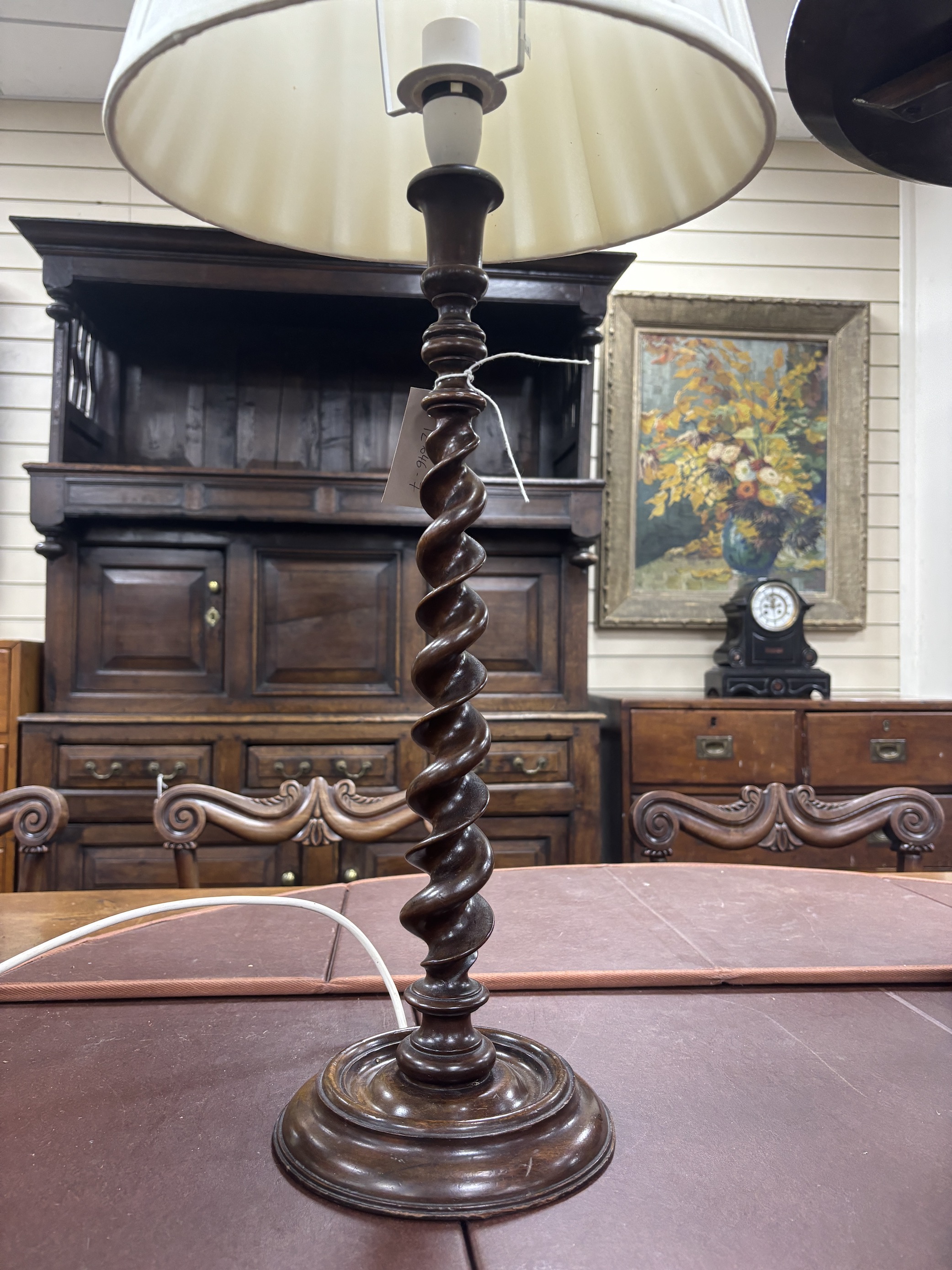 A turned beech table lamp and a circular tripod wine table